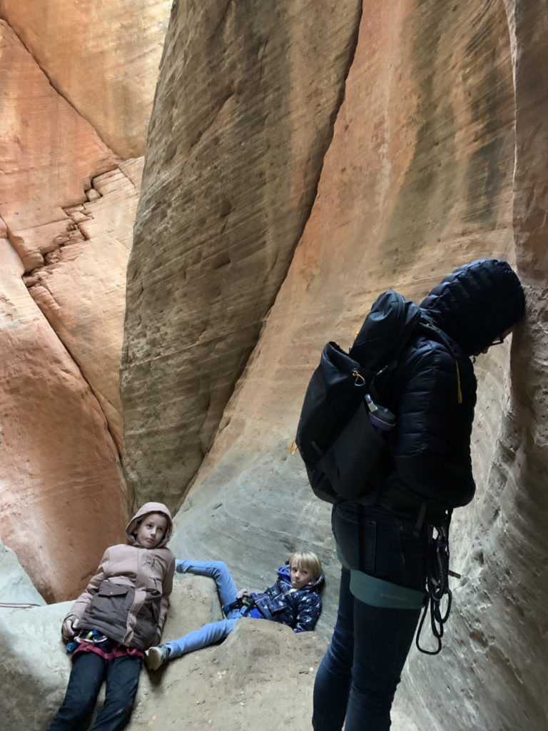 People relax in a slot canyon